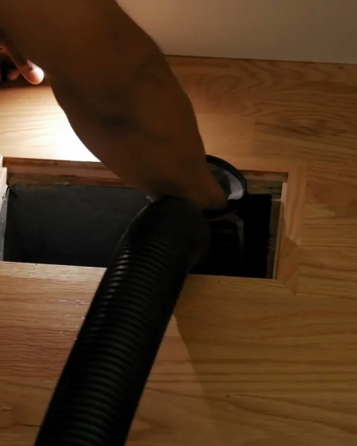 A new gas furnace installed in a utility closet with clean ductwork
